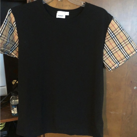 Burberry plaid sleeves. Nova check